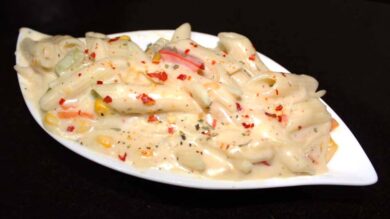 white sauce pasta recipe image in a bowl