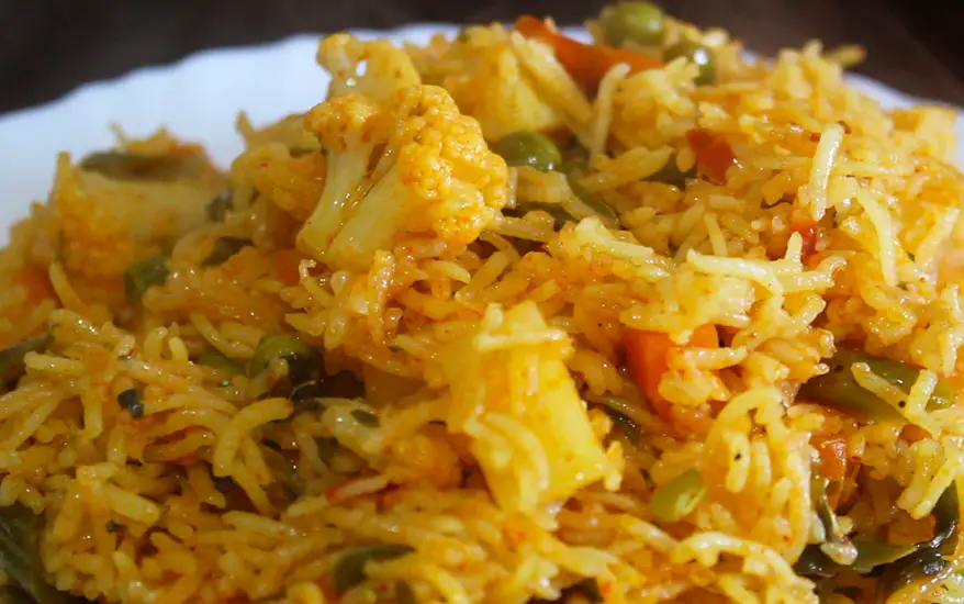 recipe veg pulao image in a white plate