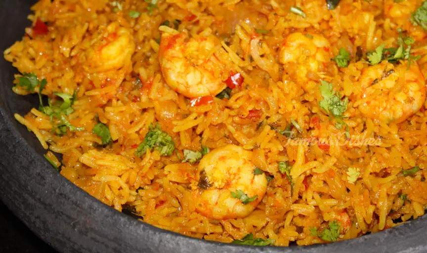 Recipe for Prawn Pulao in a black plate