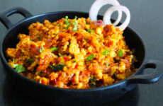 Paneer Bhurji Recipe in a black plate