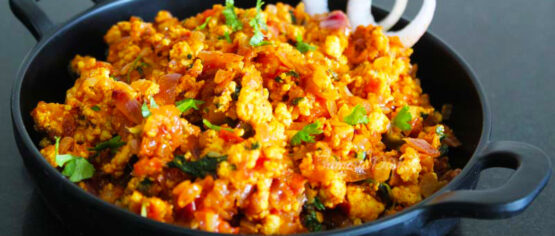 Paneer Bhurji Recipe in a black plate