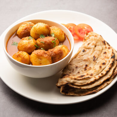 Dum Aloo Recipe image in a white plate