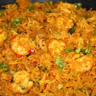 recipe-of-prawns-pulao-in-a-black-plate-n