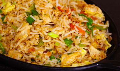 chicken fried rice recipe in black plate