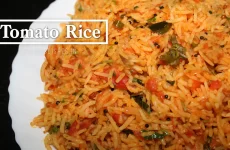 recipe tomato rice in a white plate