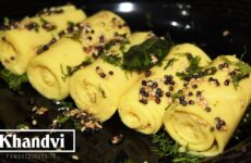 khandvi recipe image in a black plate