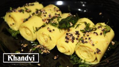 khandvi recipe image in a black plate