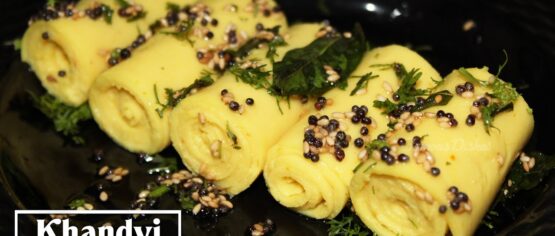 khandvi recipe image in a black plate