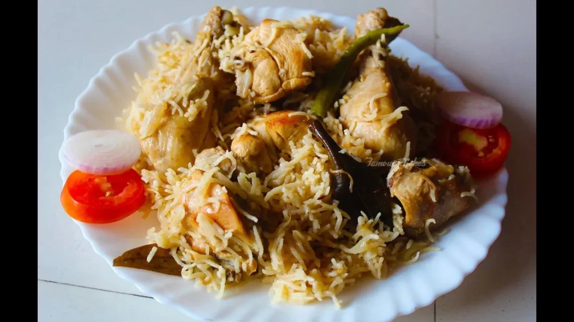 Chicken Yakhni Pulao Recipe in white plate